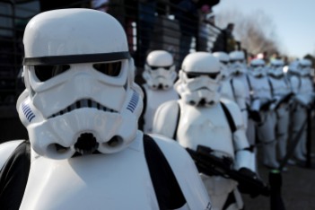 Star Wars Stormtroopers pose for photographers in a queue at Legoland in Windsor west of London on March 24, 2012, to mark the launch of the new Star Wars Miniland Experience. AFP PHOTO/CARL COURT (Photo credit should read CARL COURT/AFP/Getty Images)